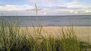 On the beach, white sand, beach towels