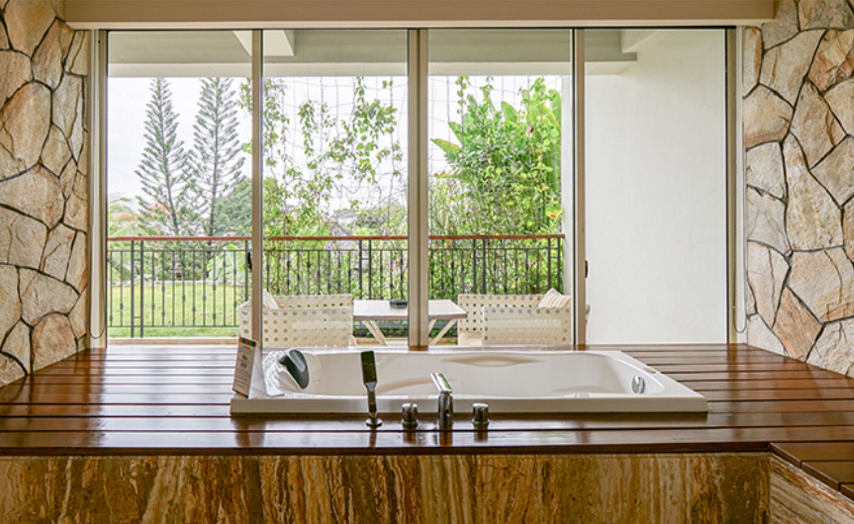 tstone jacuzzi suite (standard check out at 2:00 pm) | bathroom | free toiletries, hair dryer, bathrobes, slippers