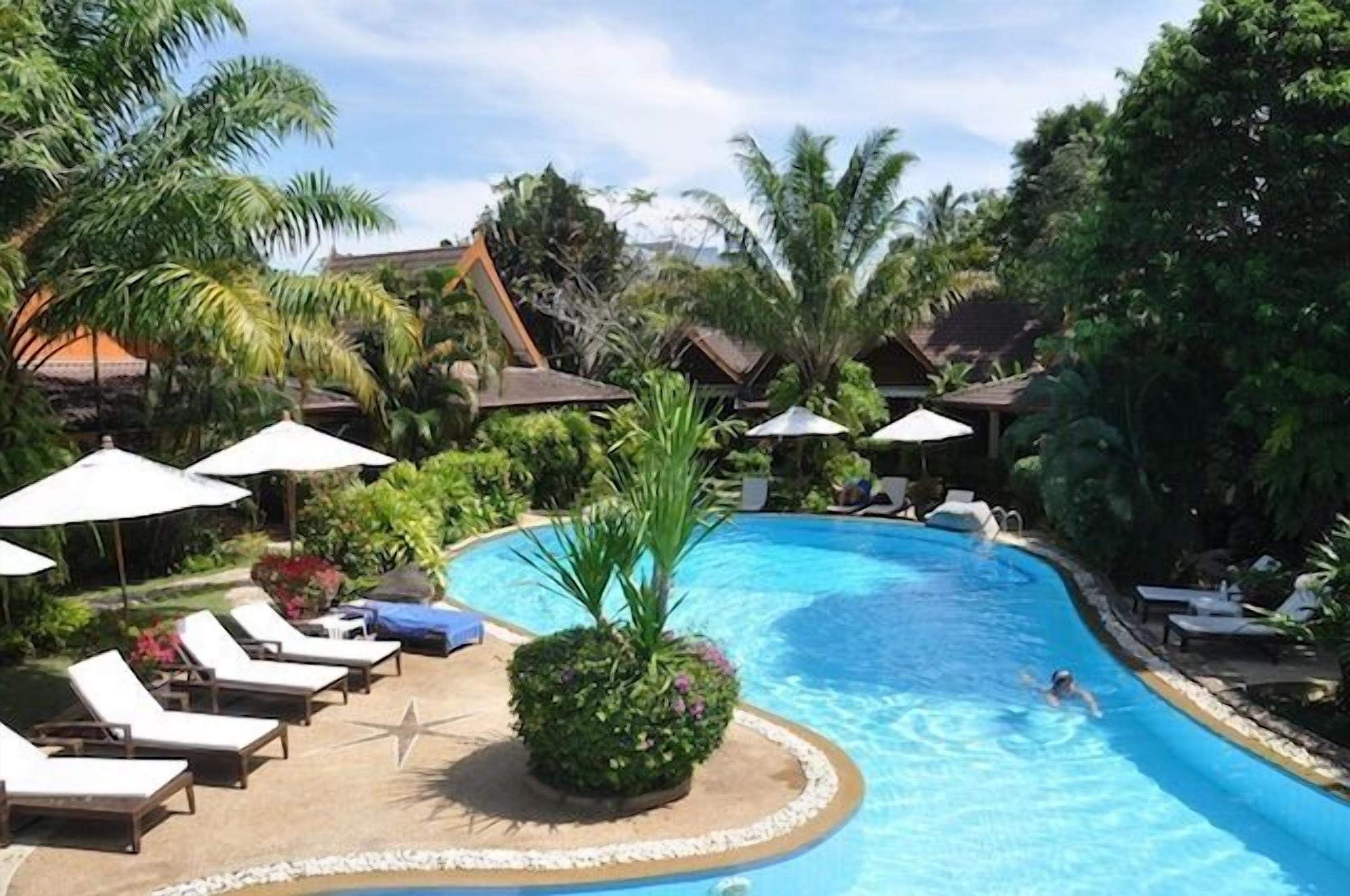 outdoor pool, pool umbrellas, pool loungers