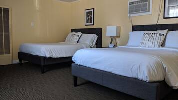 Deluxe Room, 2 Double Beds, Kitchen | Premium bedding, pillowtop beds, individually decorated