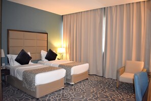 Deluxe Room, 1 Single Bed, City View | Premium bedding, minibar, in-room safe, desk - Ramada by Wyndham Abu Dhabi Corniche (Abu Dhabi)
