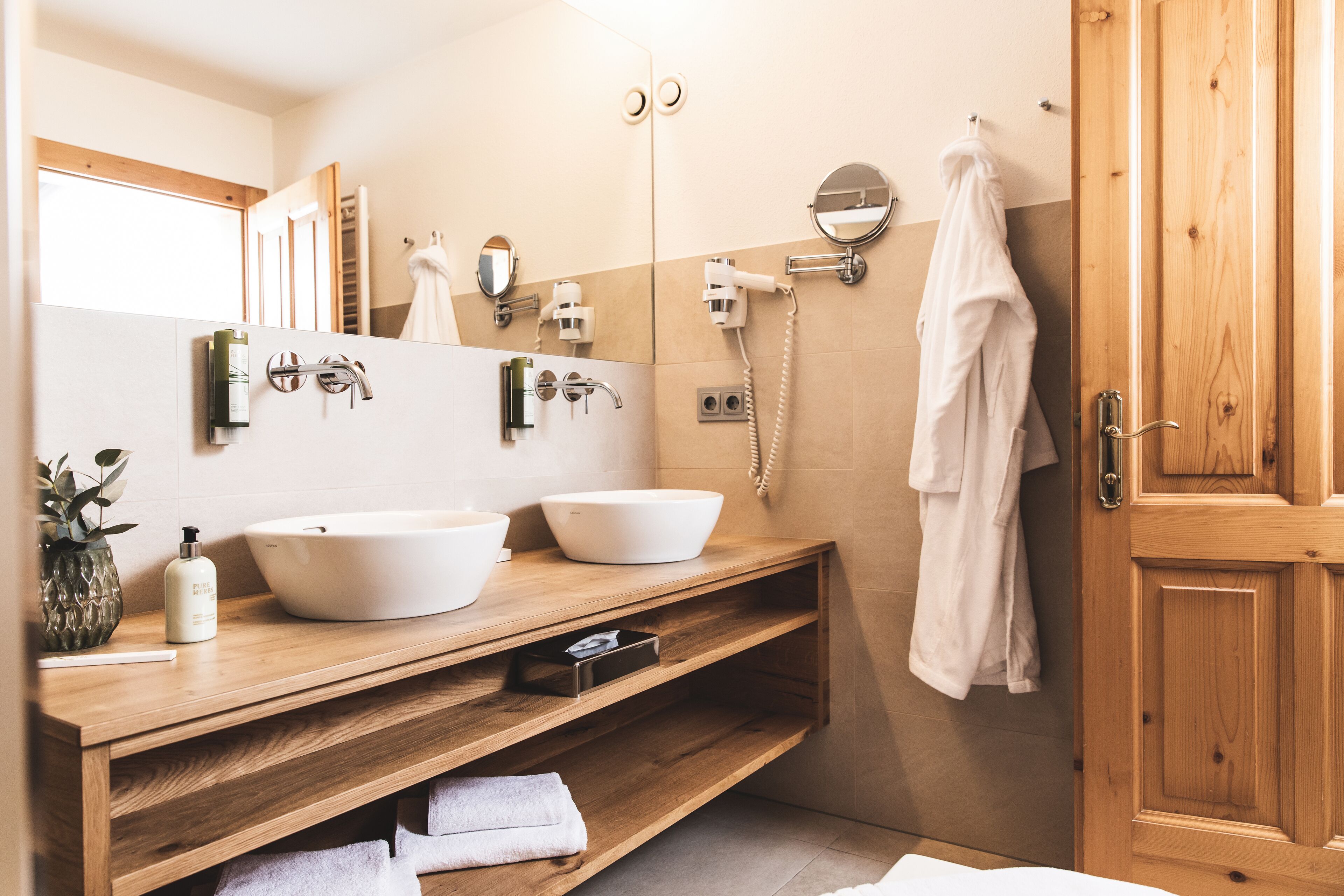 hair dryer, bathrobes, towels