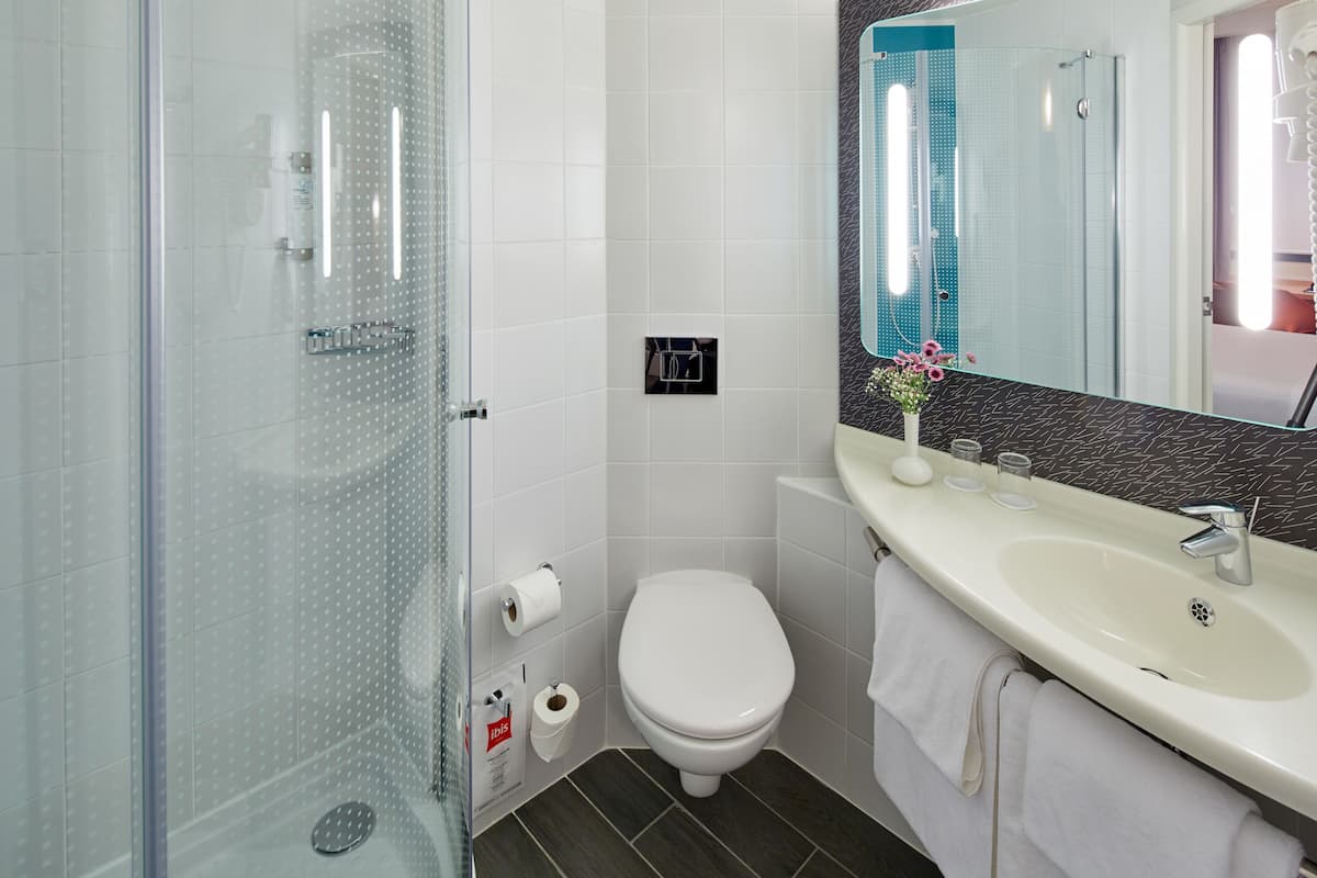 shower, eco-friendly toiletries, hair dryer, towels