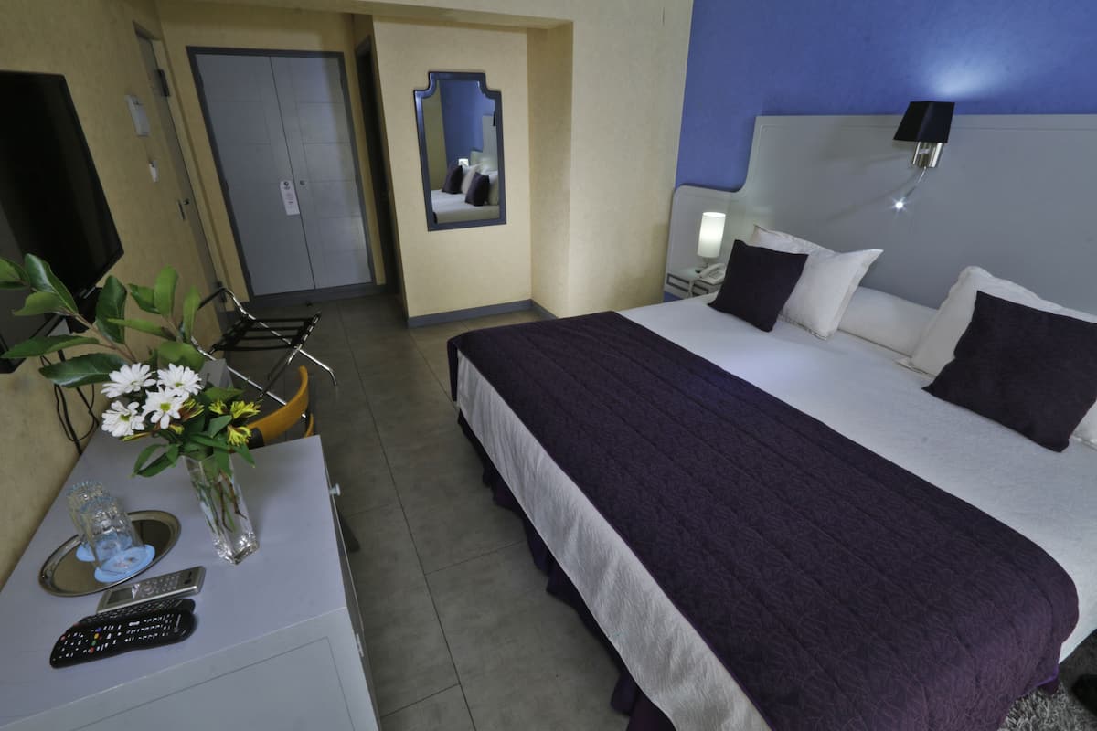 Minibar, in-room safe, blackout curtains, free WiFi