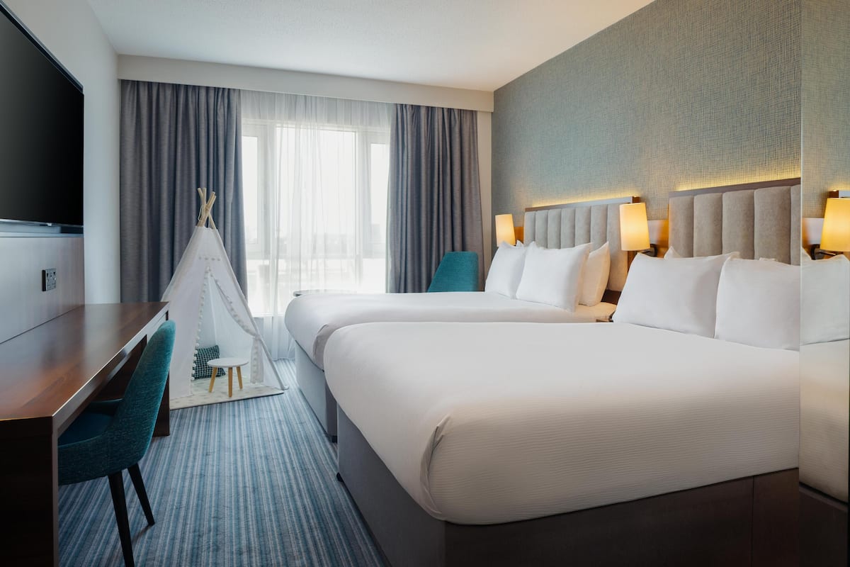 Family Room, 2 Double Beds | Hypo-allergenic bedding available, in-room safe, iron/ironing board