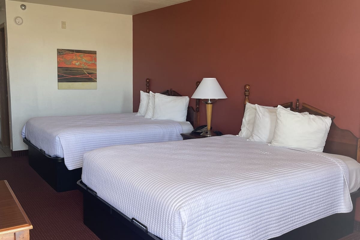 Premium bedding, desk, blackout drapes, iron/ironing board