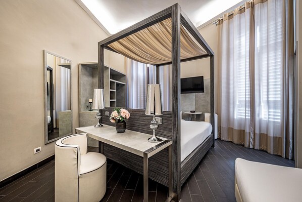 Roba de llit d'alta qualitat, minibar i caixa forta a l'habitació