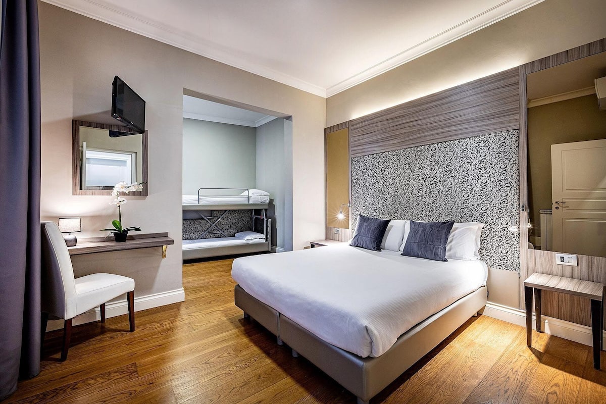 Family Room | Premium bedding, minibar, in-room safe, individually furnished