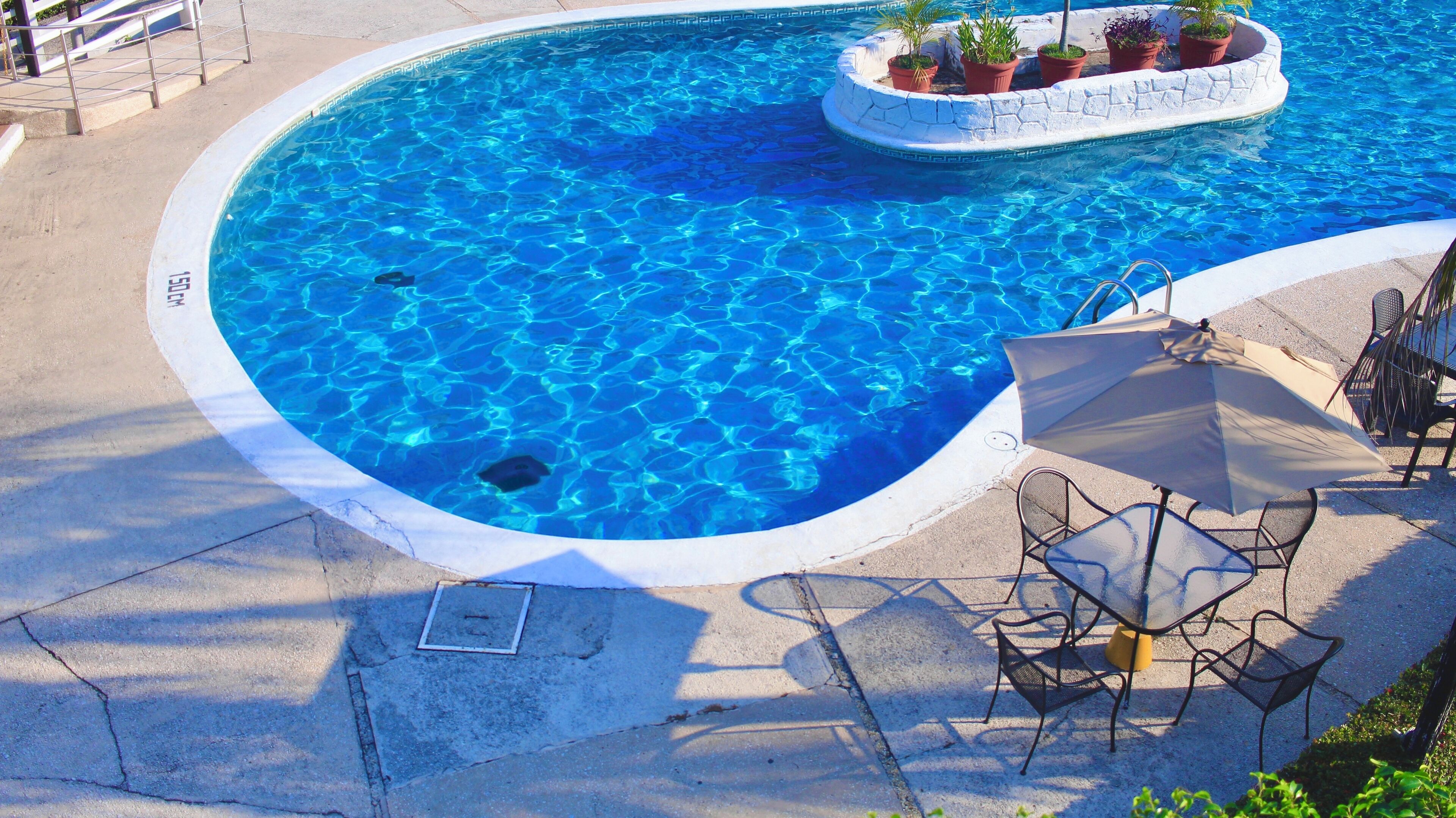 Outdoor pool, open 10:00 AM to 10:00 PM, sun loungers