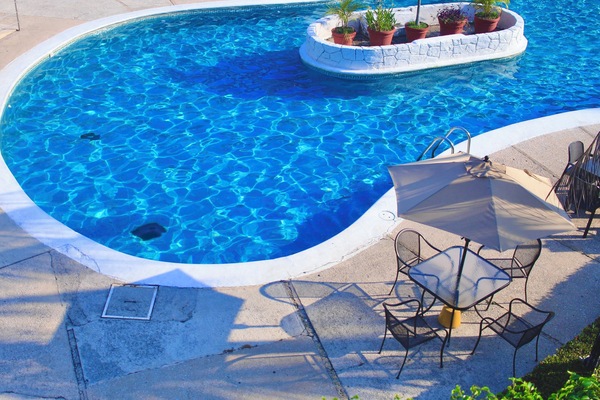 Outdoor pool, open 10:00 AM to 10:00 PM, sun loungers