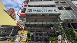 The exterior of the Prescott Hotel with a modern architectural design, featuring a prominent entrance and signage. - Prescott Hotel Bukit Bintang (Kuala Lumpur)