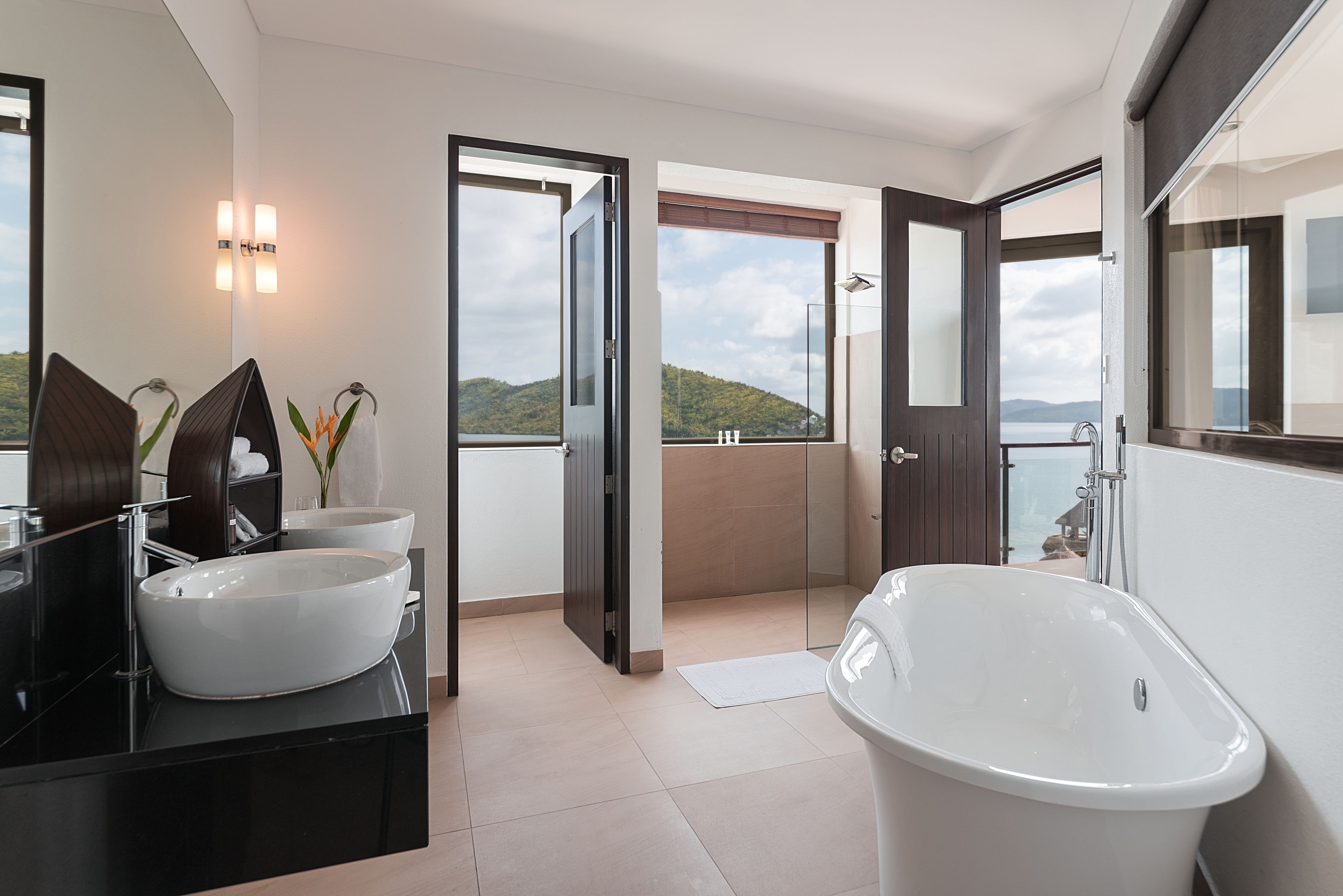 clubhouse suite | bathroom | shower, free toiletries, hair dryer, towels