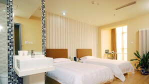A hotel room with two beds, a bathroom with a sink, and a large window with curtains. - Shanshui Trends Hotel Liu Li Qiao (Beijing)