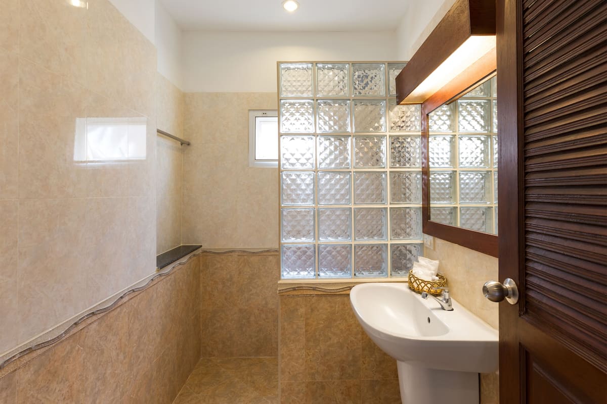 deluxe villa with pool view | bathroom sink