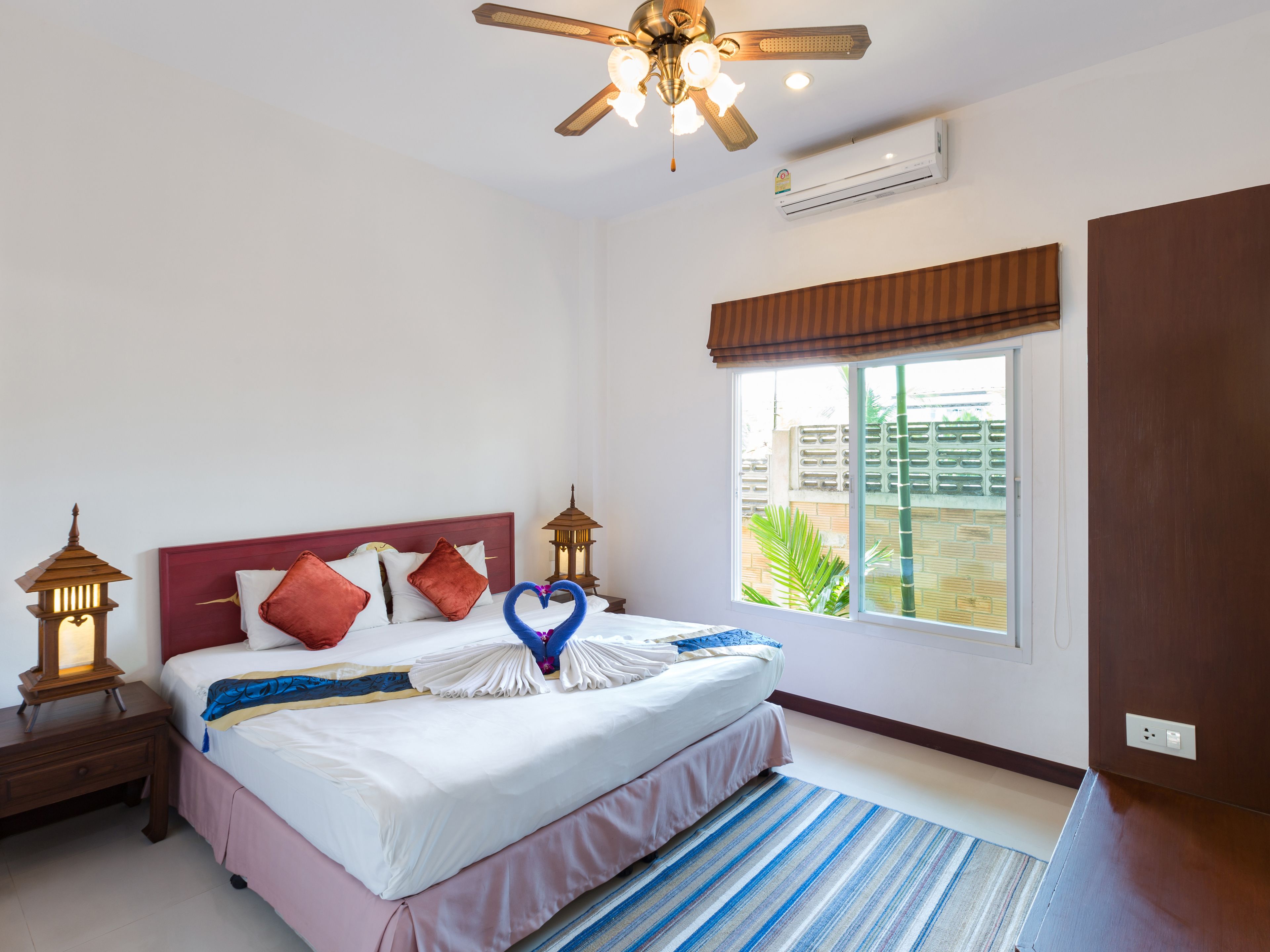 deluxe villa with pool view | minibar, in-room safe, desk, iron/ironing board