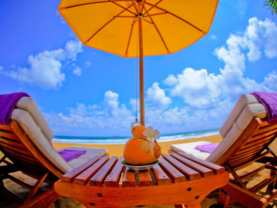 On the beach, sun loungers, beach towels