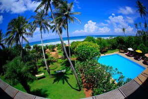 On the beach, sun loungers, beach towels