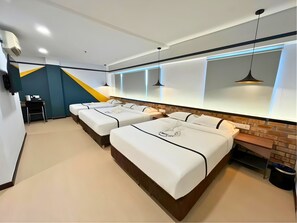 Family Room, Multiple Beds | Minibar, in-room safe, desk, laptop workspace