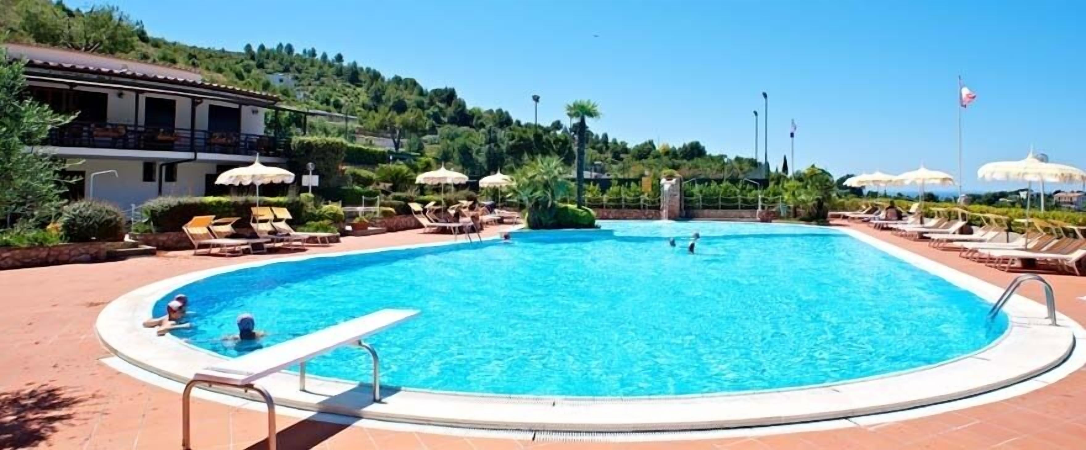 Outdoor pool, pool umbrellas, pool loungers