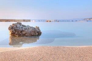 Seasonal outdoor pool, open 9:00 AM to 7:00 PM, pool umbrellas