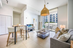 Apartment, 1 Bedroom, Balcony with Sea View | Living area | 49-inch flat-screen TV with cable channels, LCD TV - Monte Carlo by Miami Vacations (Miami Beach)