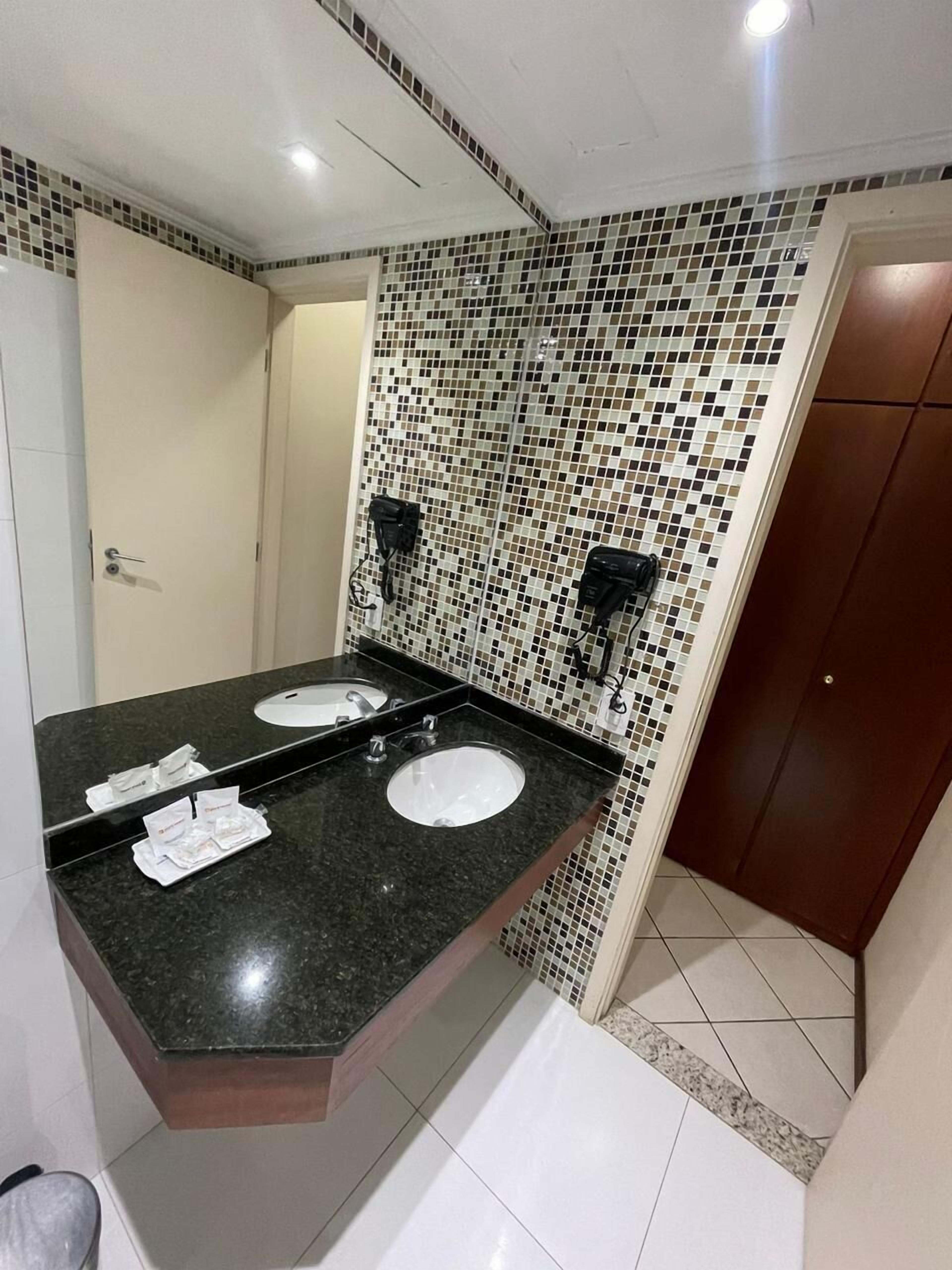 superior twin room | bathroom | shower, free toiletries, slippers, towels