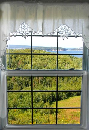 Deluxe kamer, 1 queensize bed met slaapbank, uitzicht op zee | Uitzicht vanuit de kamer