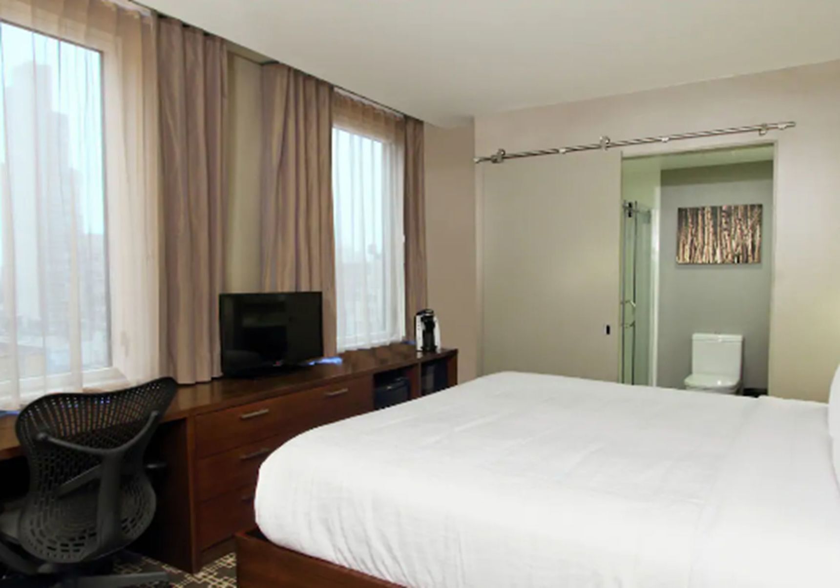 Ropa de cama de alta calidad y camas con pillow-top 