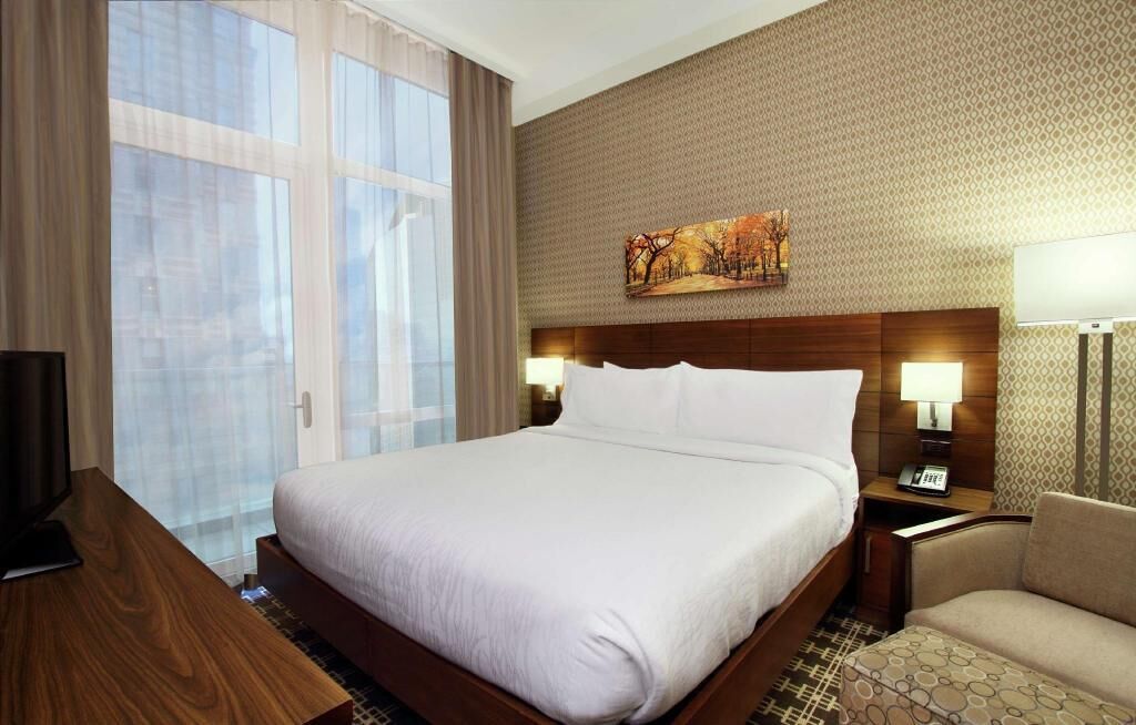 Ropa de cama de alta calidad y camas con pillow-top 