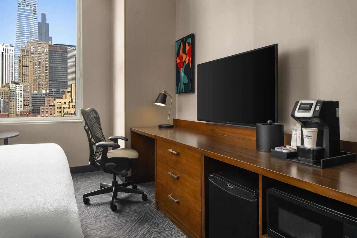 Luxe beddengoed, pillowtop-bedden, een kluis op de kamer