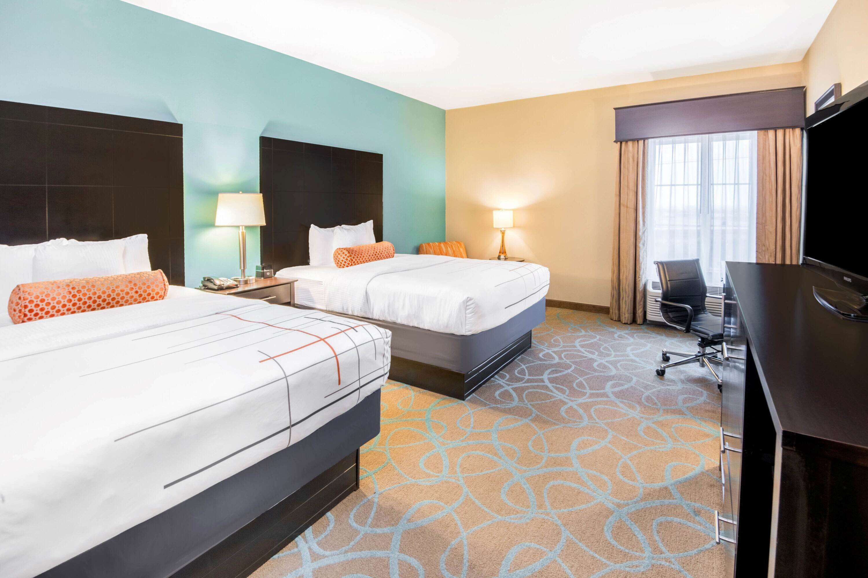 premium bedding, pillow-top beds, desk, iron/ironing board