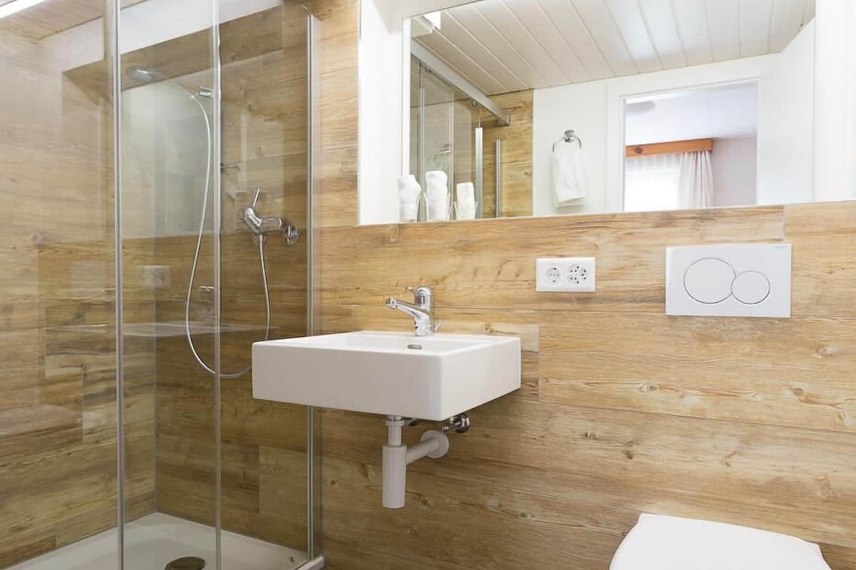 double or twin room, 2 single beds, balcony, mountain view | bathroom | hair dryer, towels, soap, shampoo