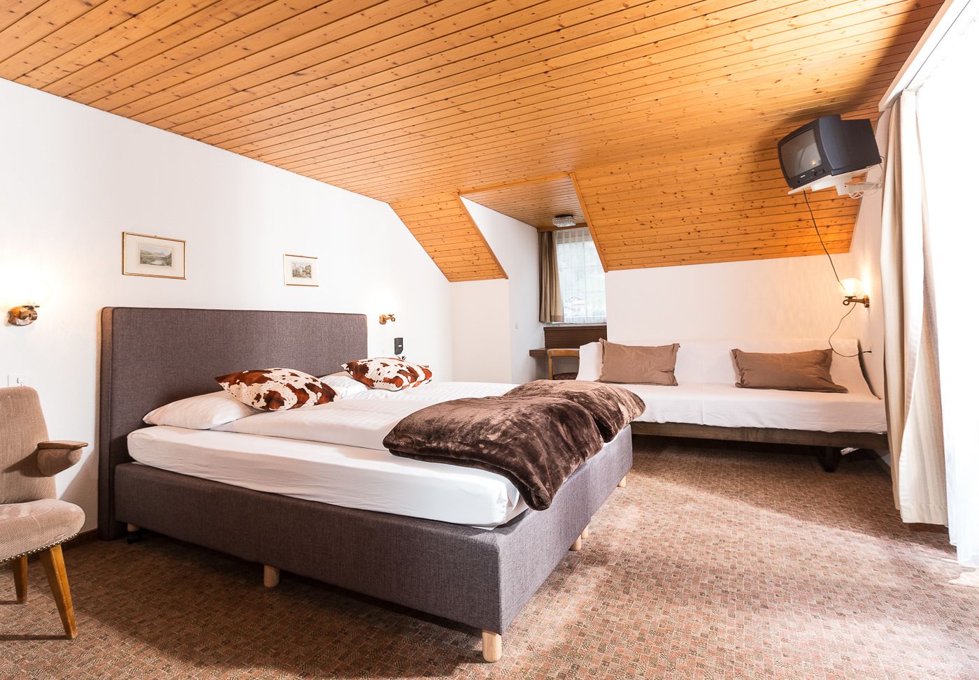 double or twin room, 2 single beds, balcony, mountain view | down duvets, individually decorated, desk, blackout curtains