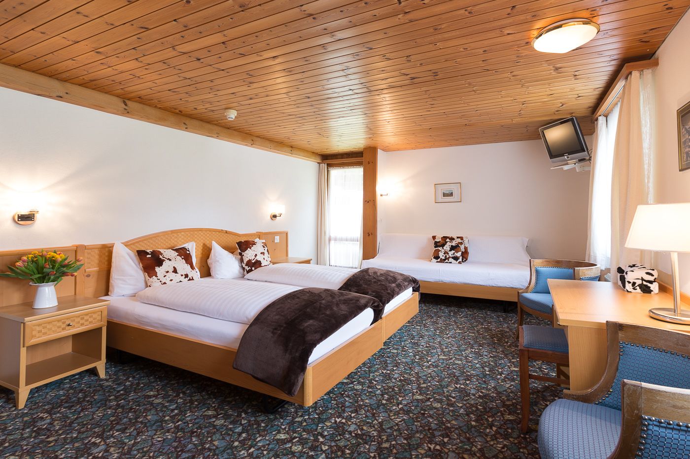 double or twin room, 2 single beds, balcony, mountain view | down duvets, individually decorated, desk, blackout curtains