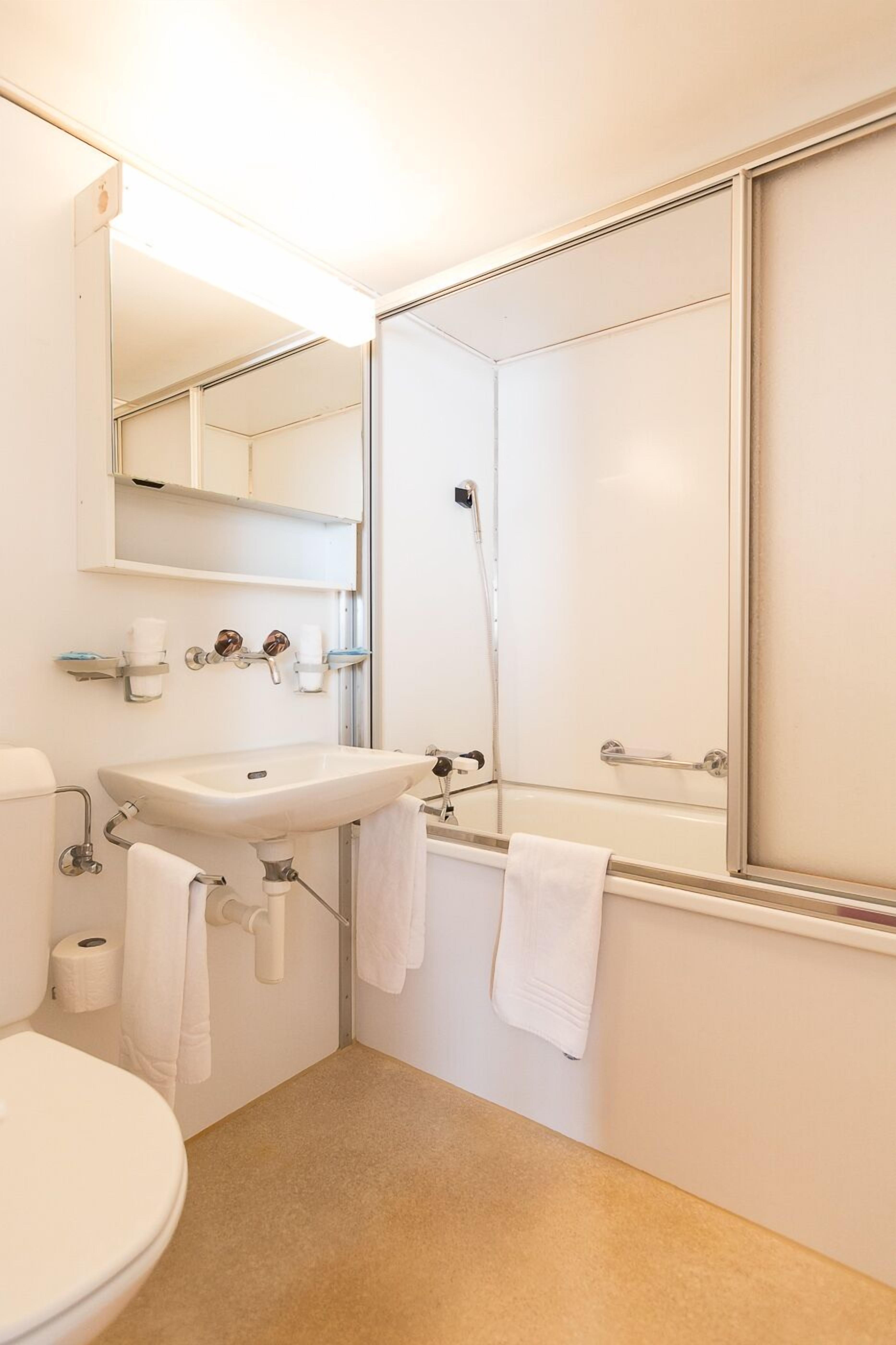 double or twin room, 2 single beds, balcony, mountain view | bathroom | hair dryer, towels, soap, shampoo