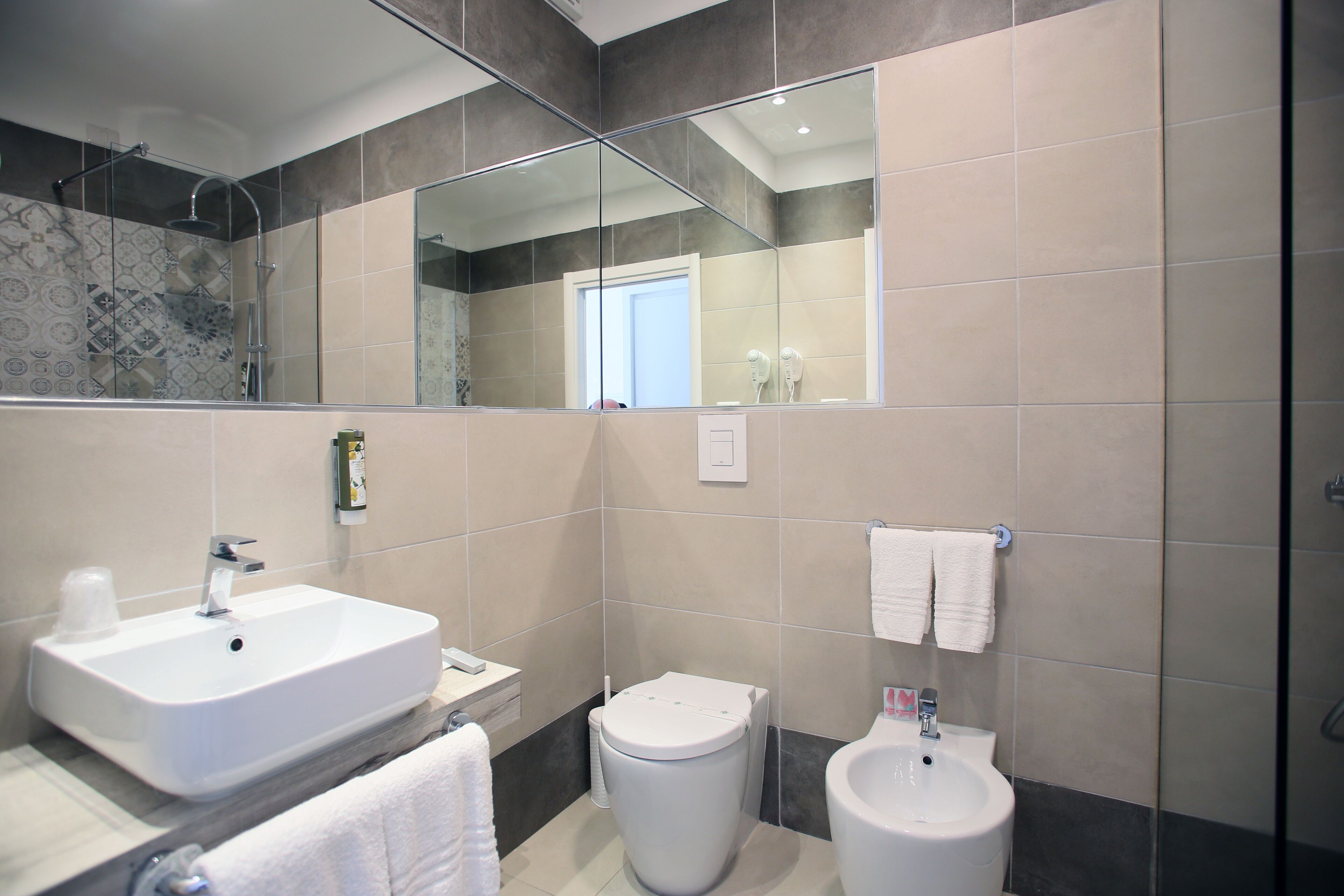 double room | bathroom | shower, hair dryer, bidet, towels