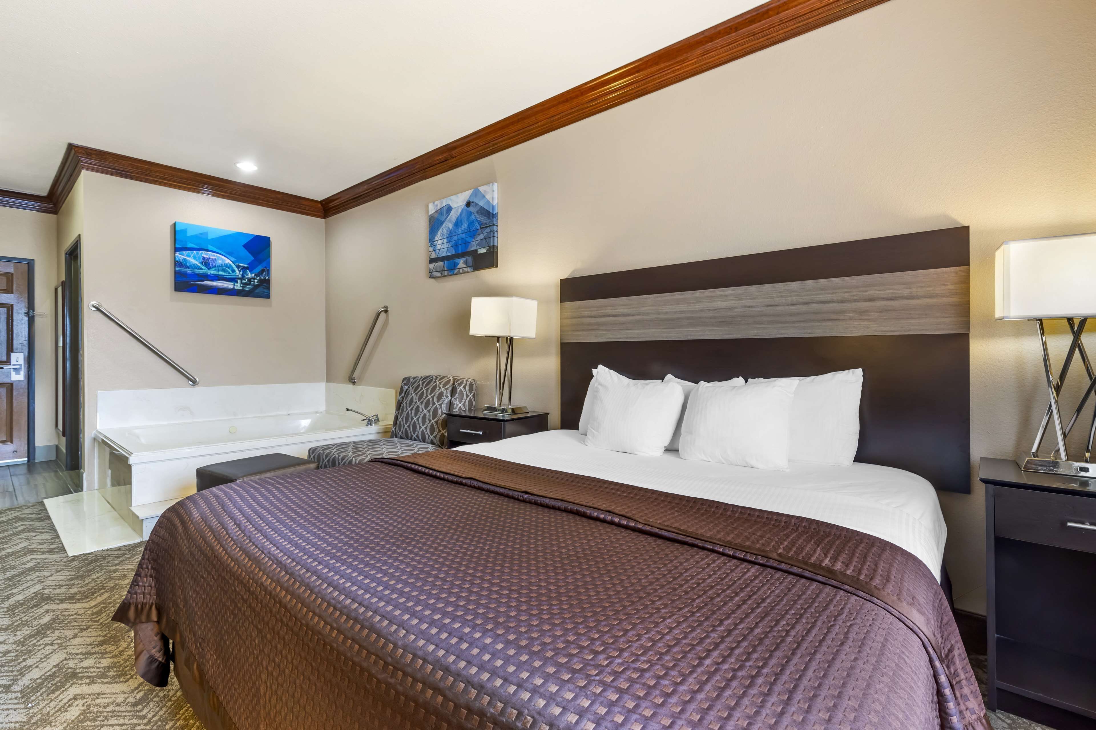 suite, 1 king bed, non smoking, jetted tub (oversized room) | desk, laptop workspace, blackout curtains, iron/ironing board