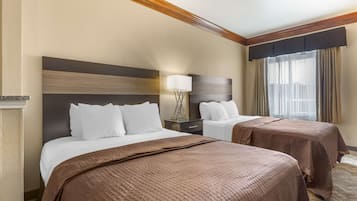 Suite, 2 Queen Beds, Non Smoking, Refrigerator & Microwave (with Single Sofabed) | Desk, laptop workspace, blackout drapes, iron/ironing board