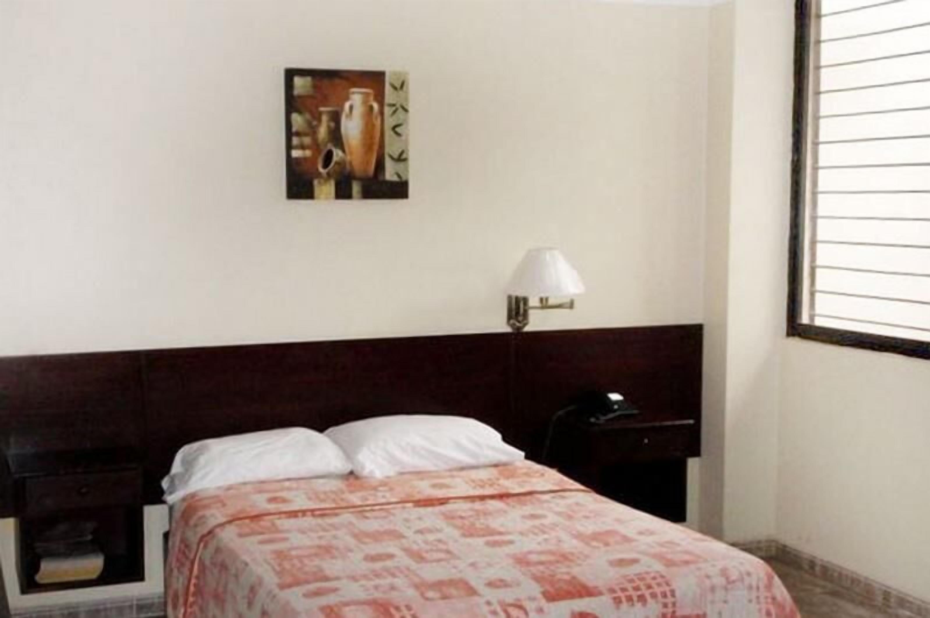 Down comforters, in-room safe, blackout drapes, free WiFi