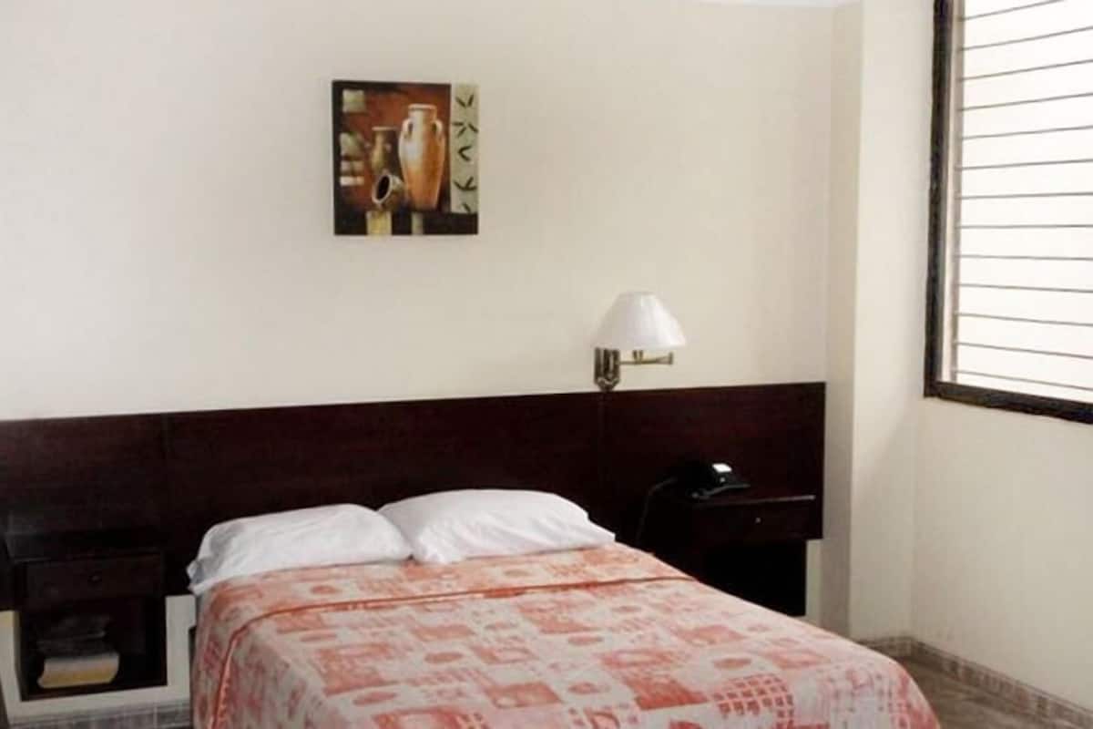 Down comforters, in-room safe, blackout drapes, free WiFi