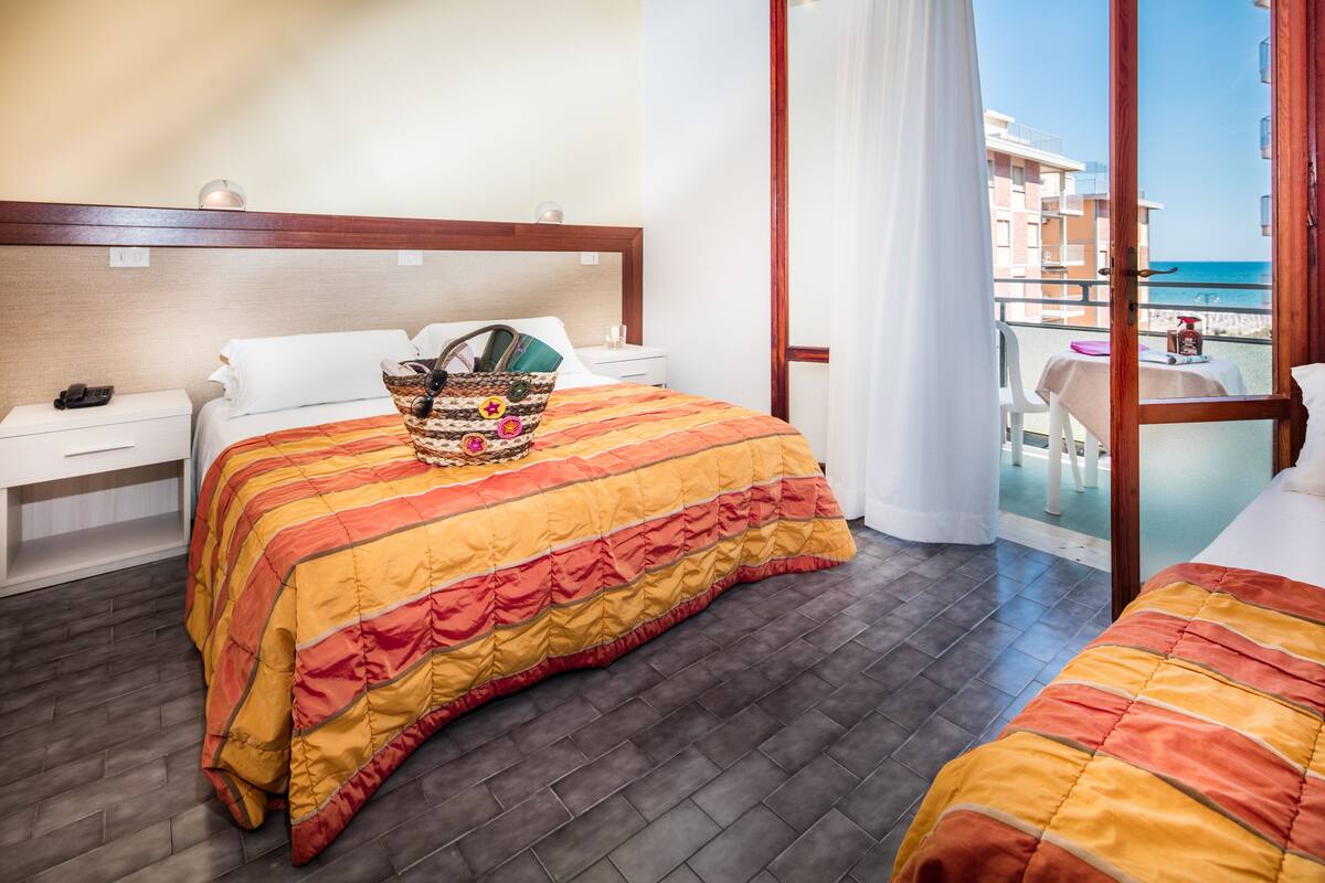 Standard Triple Room, Partial Sea View | In-room safe, desk, WiFi (free)