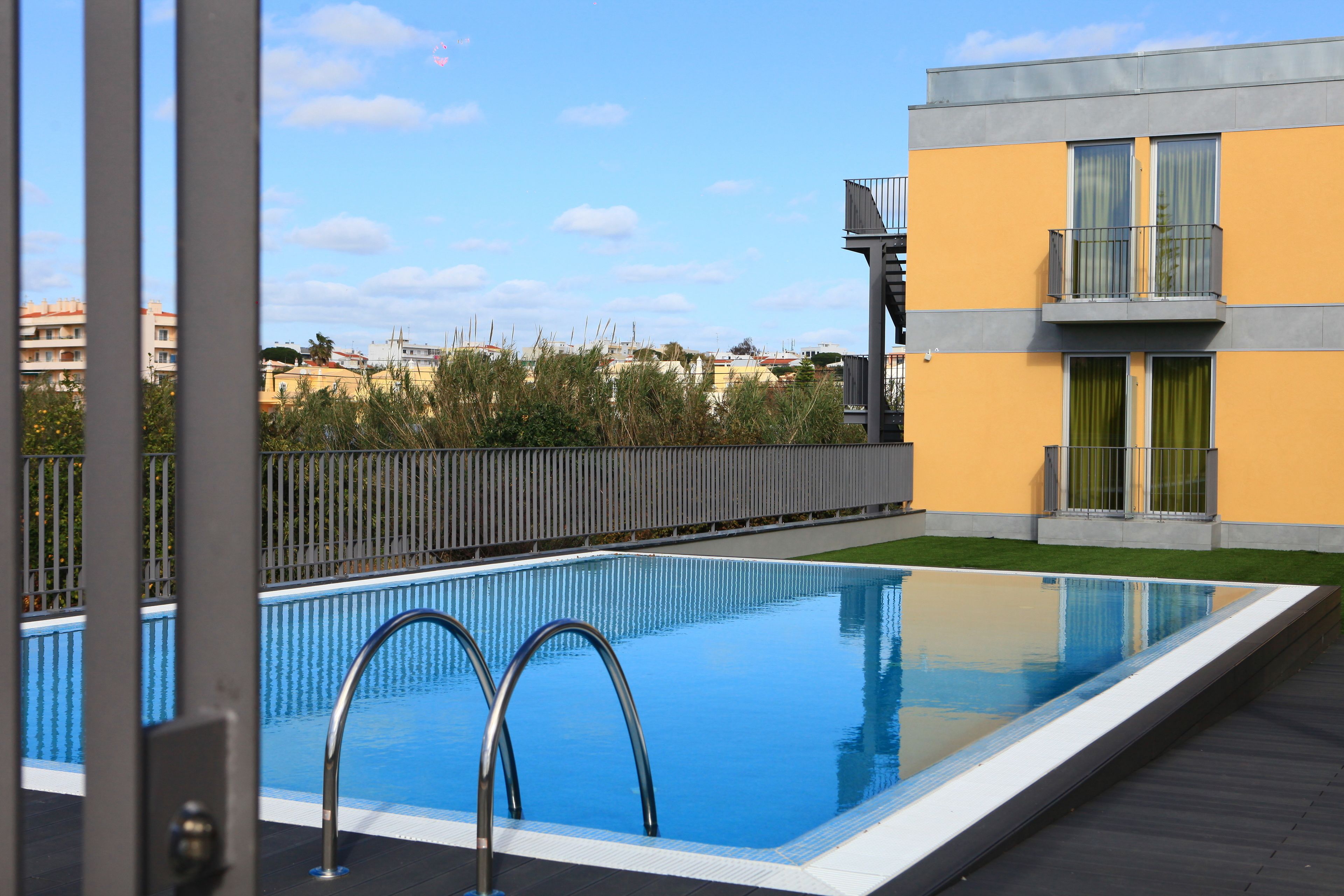 outdoor pool, pool loungers