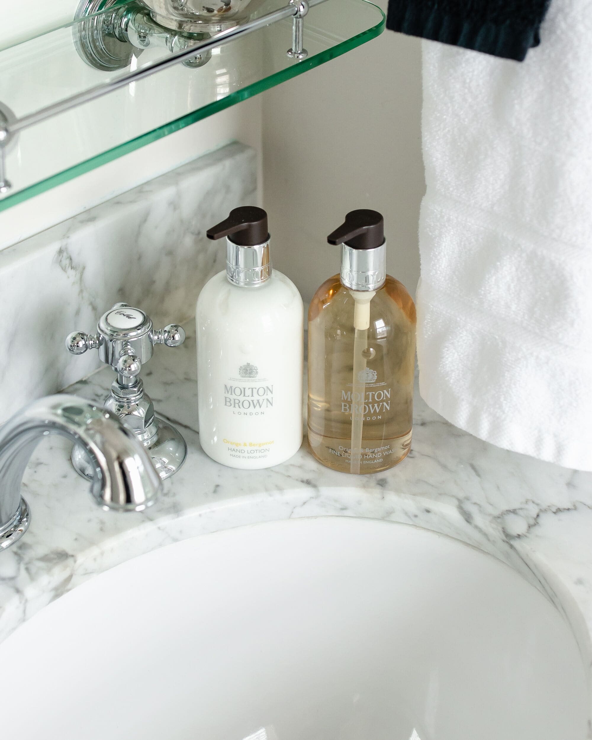 designer toiletries, hair dryer, bathrobes, slippers