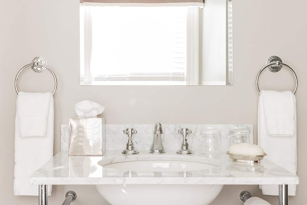 designer toiletries, hair dryer, bathrobes, slippers