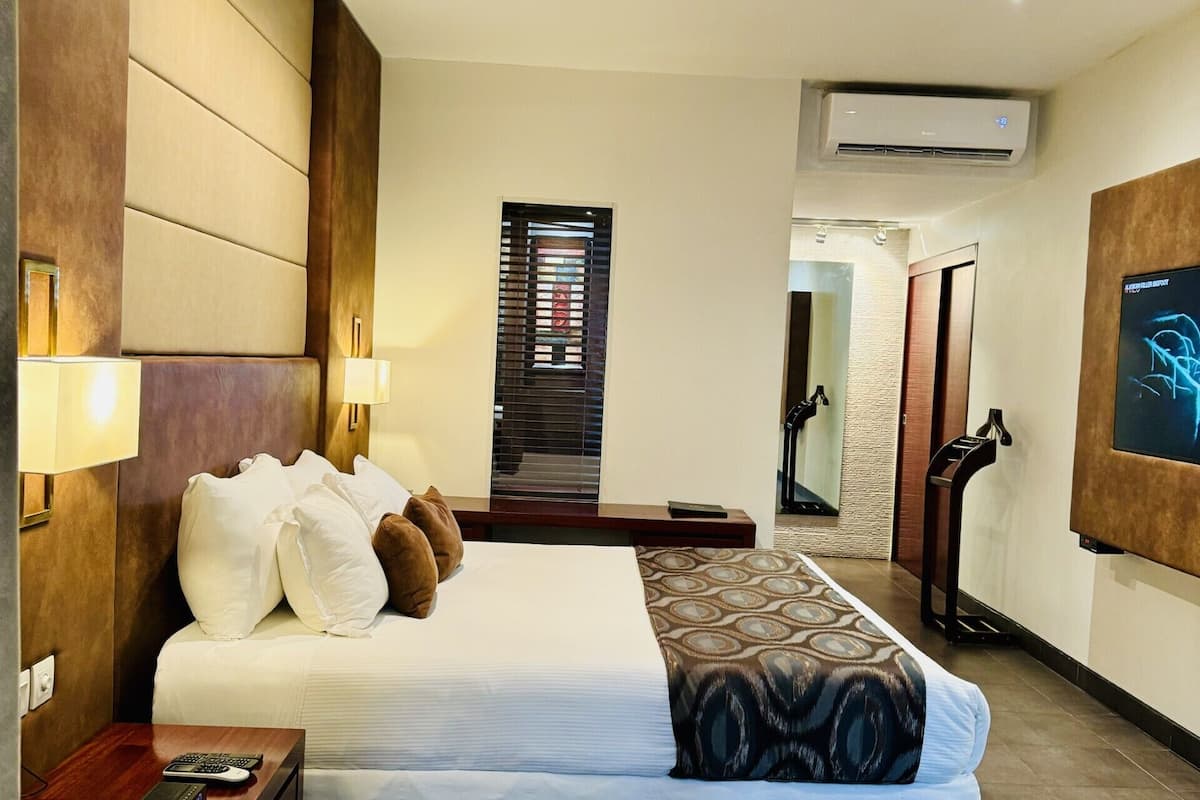 executive room | in-room safe, desk, laptop workspace, iron/ironing board