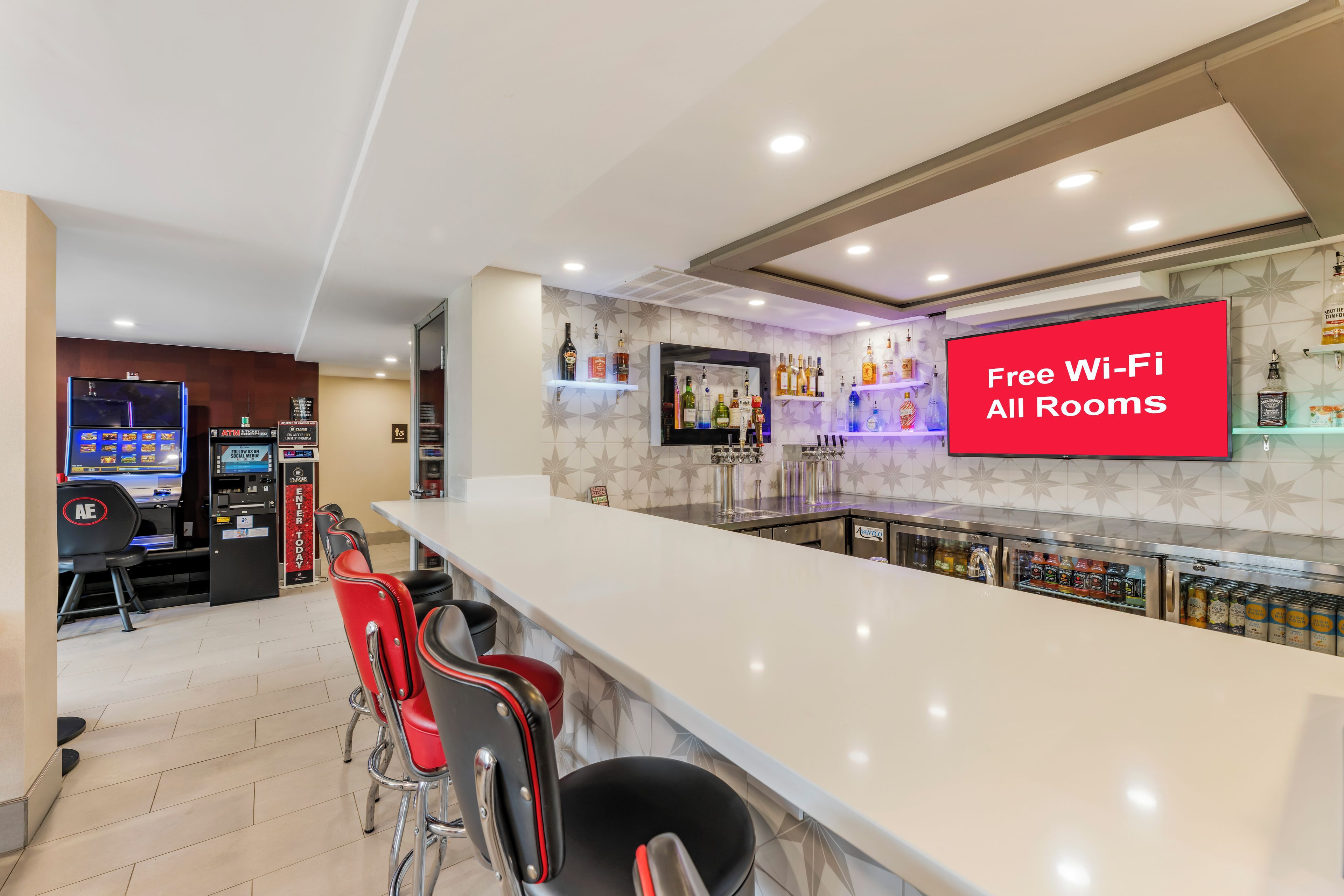 A bar area with a sign indicating free Wi-Fi availability.