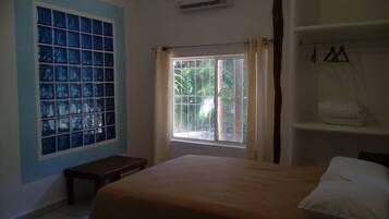 Habitación estándar, tina, planta baja (with air conditioner) | Ropa de cama