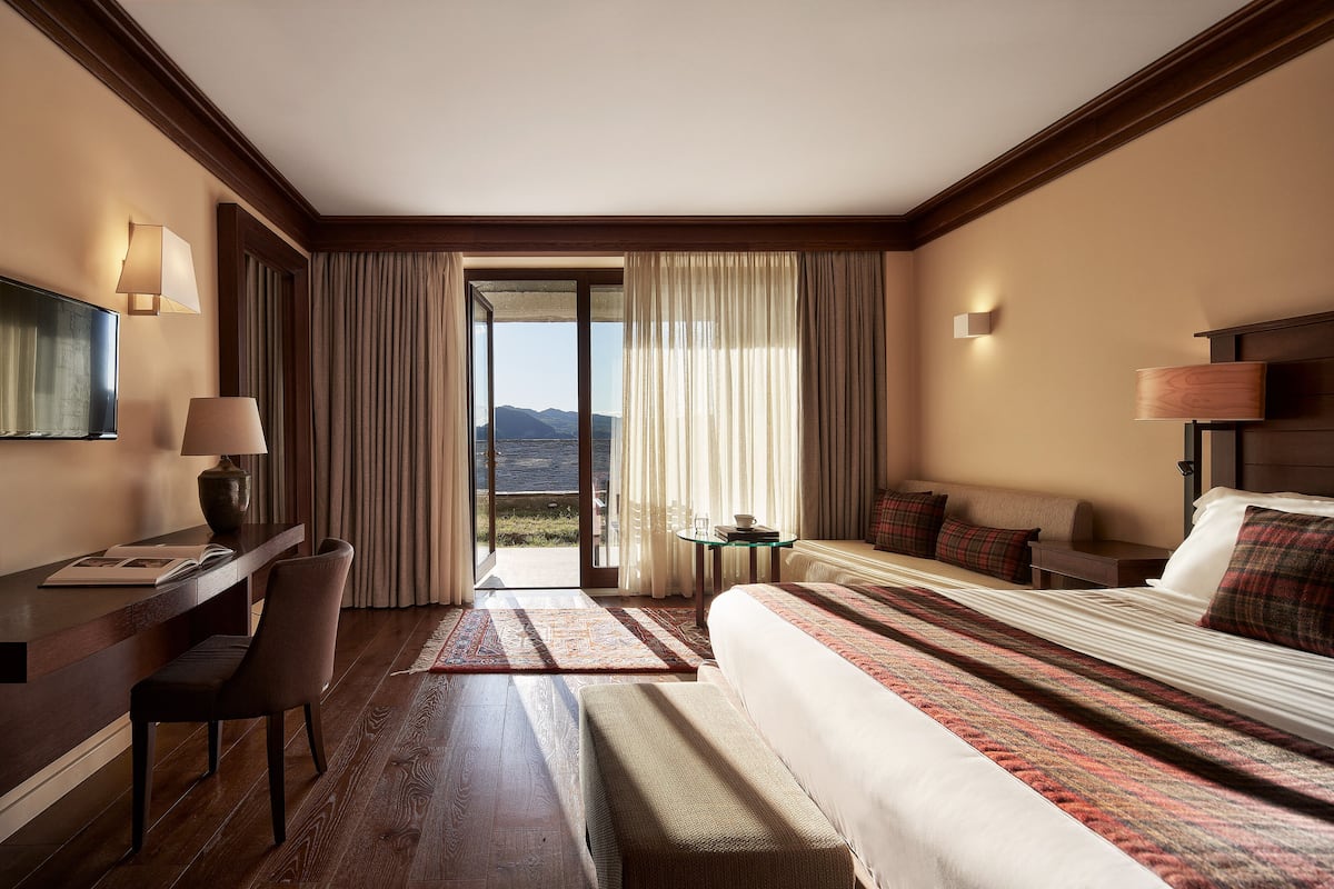 Junior Suite with Garden View | 1 bedroom, Frette Italian sheets, premium bedding, down comforters