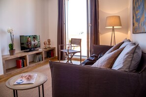 Suite, balcon | Coin séjour