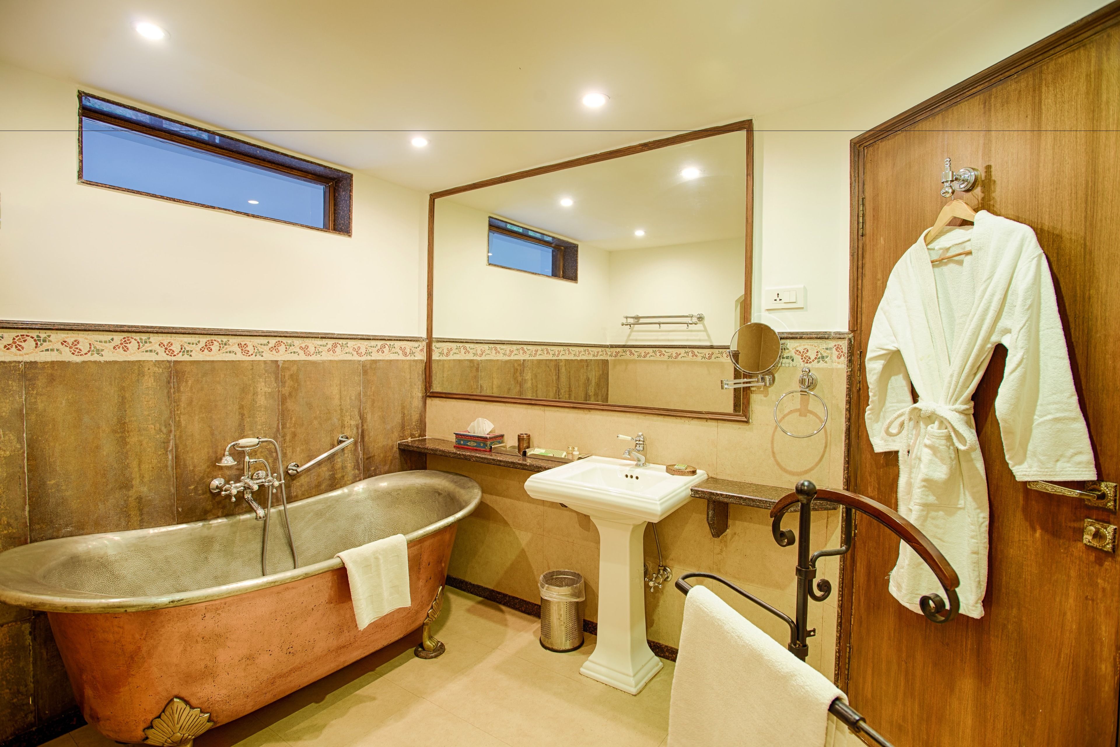 separate bathtub and shower, jetted bath, rainfall showerhead